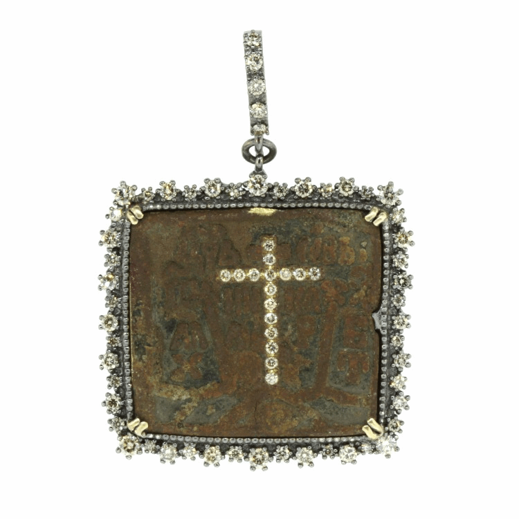 Icons tell a visual story to the faithful and help the faithful pray and meditate. Small metal Icons have a 1000-year-old history and were often called “Traveler's Icon”. Devoted individuals, soldiers and others would take them into battle or on their travels for protection. Traditionally made of bronze / brass, they were wearable and small (2 x 2.5 in). The soft brass originals were submitted to the constant wear of devoted fingers, recording the history of heavy prayer on these sacramentals. Besides spiritual protection through prayer, the icon provided physical protection as well.
69 CH DIA, 1.44 TW Russian Icon With Diamond Cross Inlay