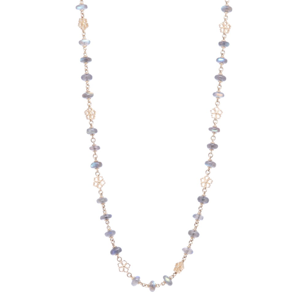 This 32" labradorite necklace has a beautiful iridescent blue and green hue. The beads are strung with solid 14k Yellow Gold and there are handmade gold flowers every 3 or 4 beads. The total gold weight is 31.90g. Labradorite Yellow Gold Necklace with Flower Stations 34"