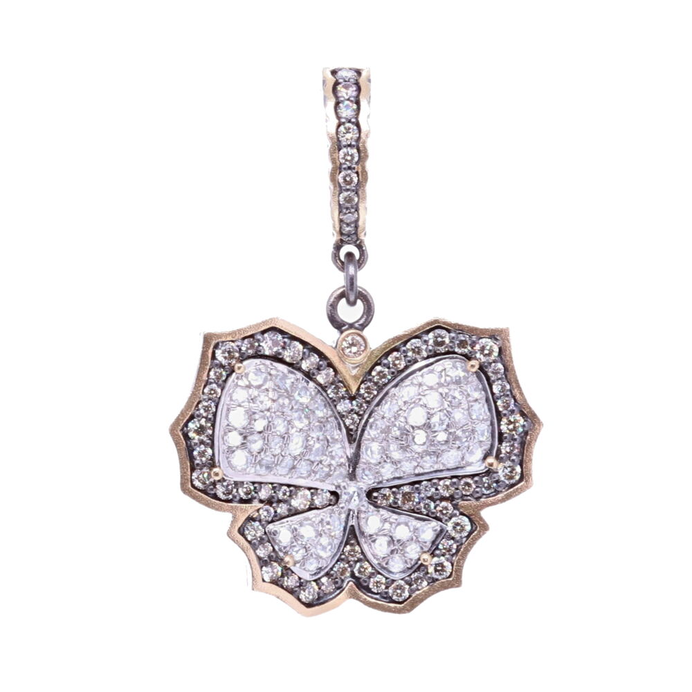 The butterfly is the symbol of resurrection and eternal life because they metamorphose from a caterpillar to a chrysalis and finally becomes a butterfly. Many believe that the soul left the body in the form of a butterfly. Aristotle named the butterfly 'psyche' which is the Greek word for Soul. This beautiful and sparkly butterfly pendant has 1.21 tcw Diamonds, 3.77g 14k Yellow Gold, and rhodium sterling silver. Diamond Butterfly Pendant