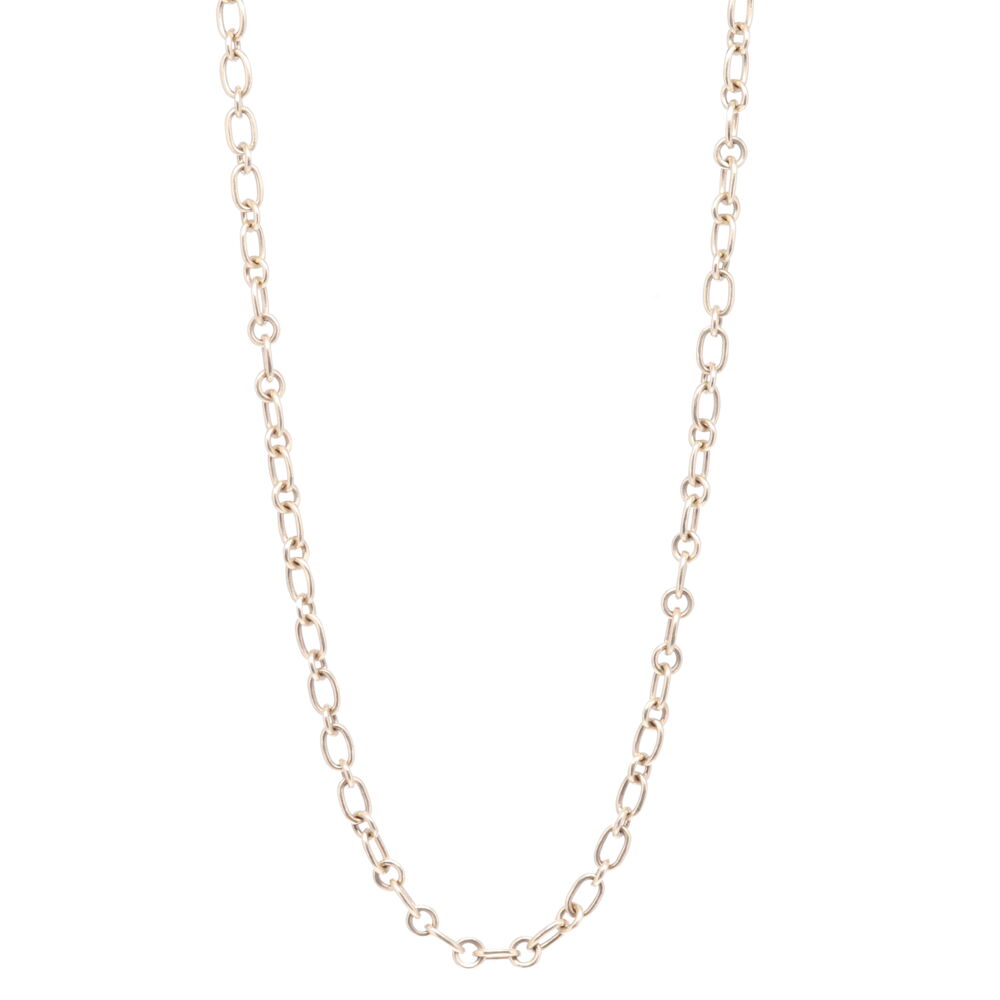 This 32" yellow gold chain has oval and circle links. The lobster clasp can be clipped onto any link at any length to create a Y-necklace. Yellow Gold Oval + Circle Link Chain 32"