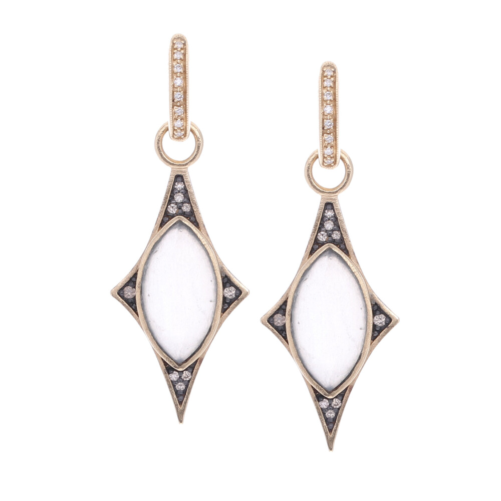 These north star shaped earrings feature a moonstone and ice quartz doublet center with eighteen sparkling champagne diamonds 0.15 tcw, 14k yellow gold 4.08g and rhodium sterling. North Star Earring Charms