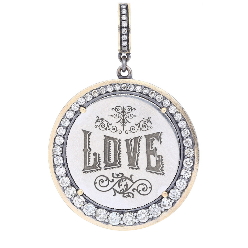 Love tokens reached their peak popularity during the Victorian era but are believed to have originated somewhere in Great Britain during the 1500’s. Often Love Tokens were exchanged between sweethearts as “tokens of love” or even marriage proposals. Love Tokens are generally defined as monetary coins from which one side (or sometimes both sides) have been smoothed down flat and engraved with names, phrases, monograms, and sometimes even pictorials.
Love Token Engraved With "Love"