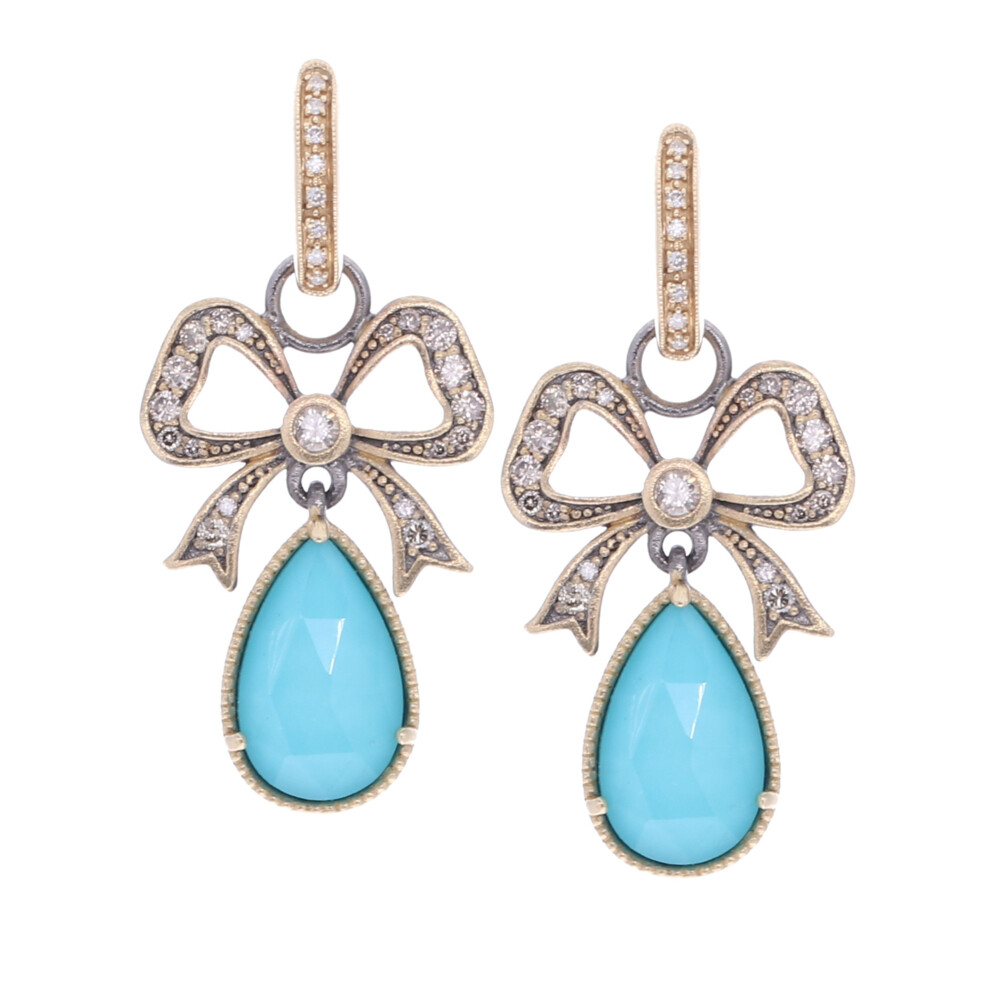 This French inspired design features two doublet pear cut turquoise drops hung from a feminine bow. The earring charms are handcrafted in 14k yellow gold 2.15g, champagne diamond, and rhodium sterling. French Bow Turquoise & Diamond Earring Charms