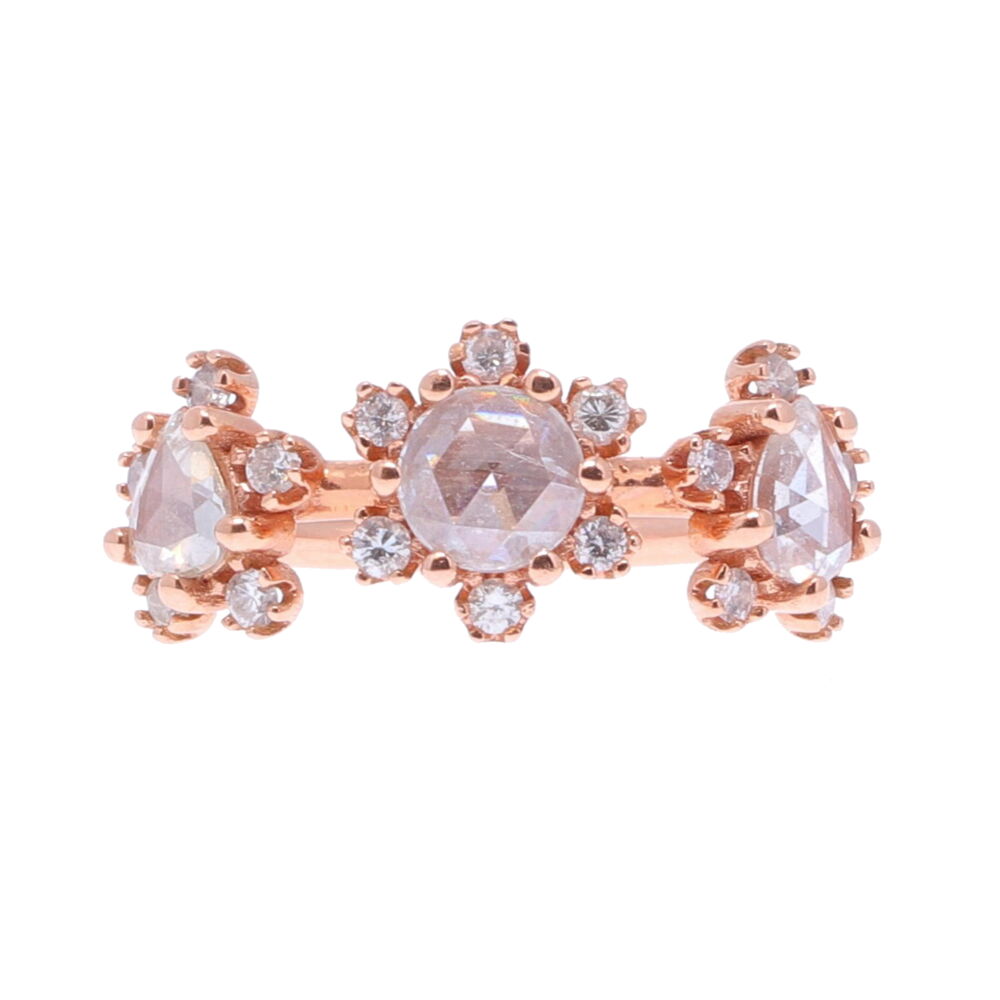 The In Bloom ring features rose cut diamonds and 14k rose gold. In Bloom Rose Cut Diamond Ring