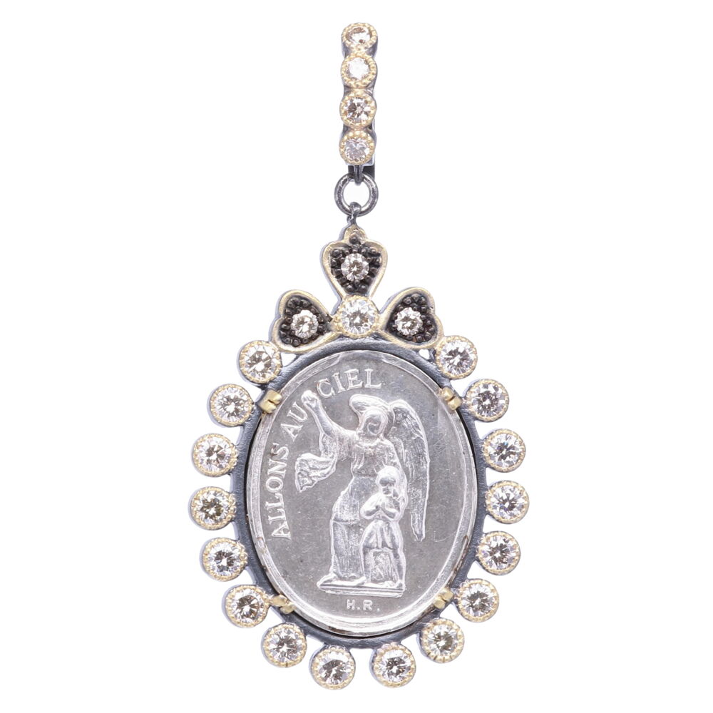 This antique silver French medal has a beautiful Guardian Angel on the front and translates to "To go to Heaven". On the back, " Here is our model". Your Guardian Angel has been with you since birth and will be with you once your pass out of body into spiritual realm. She is a reminder in your faith in God and that you are never alone. She is here is guide and protect you every step of the way. The bezel is constructed of white diamonds with 2.8 total carat weight. It has 2.74 grams of 14 karat gold and an open-able bale which will accommodate up to a 6mm chain. This beautiful pendant will be be a treasured family heirloom. Silver French Guardian Angel Pendant