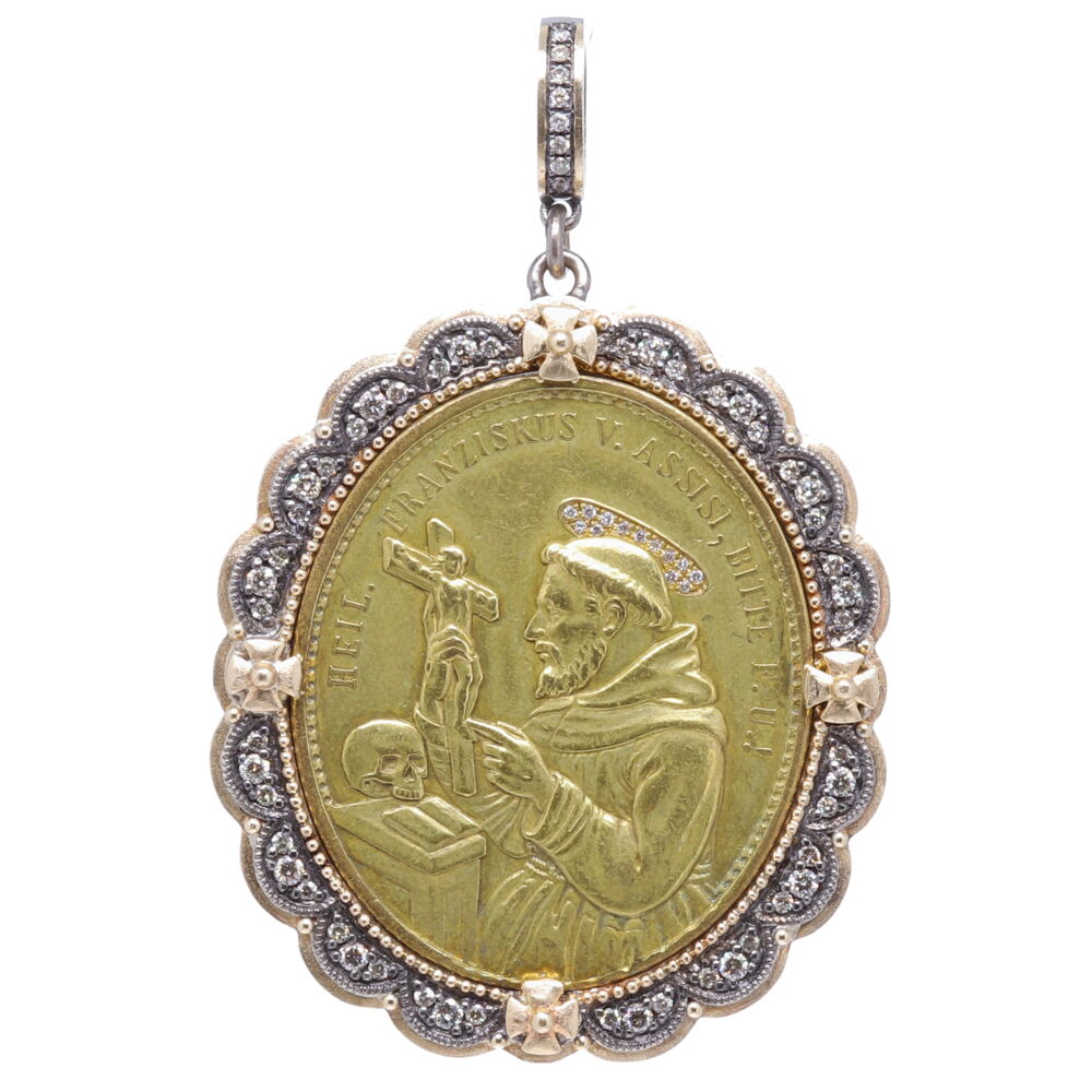 Known as the Patron Saint of animals and birds, St. Francis of Assisi understood God’s desire to love and respect all creatures. St. Francis was also the founder of the religious order known as the Franciscans. He became renowned for his love, simplicity and practice of poverty. The back of the medal depicts Mary and translates to "o Mary without sin, please know that we take refuge in you". This original German medal is set in a 14k yellow gold 7.69g, diamond 0.70tcw, and rhodium sterling bezel. German St. Francis of Assisi and Miraculous Mary Pendant