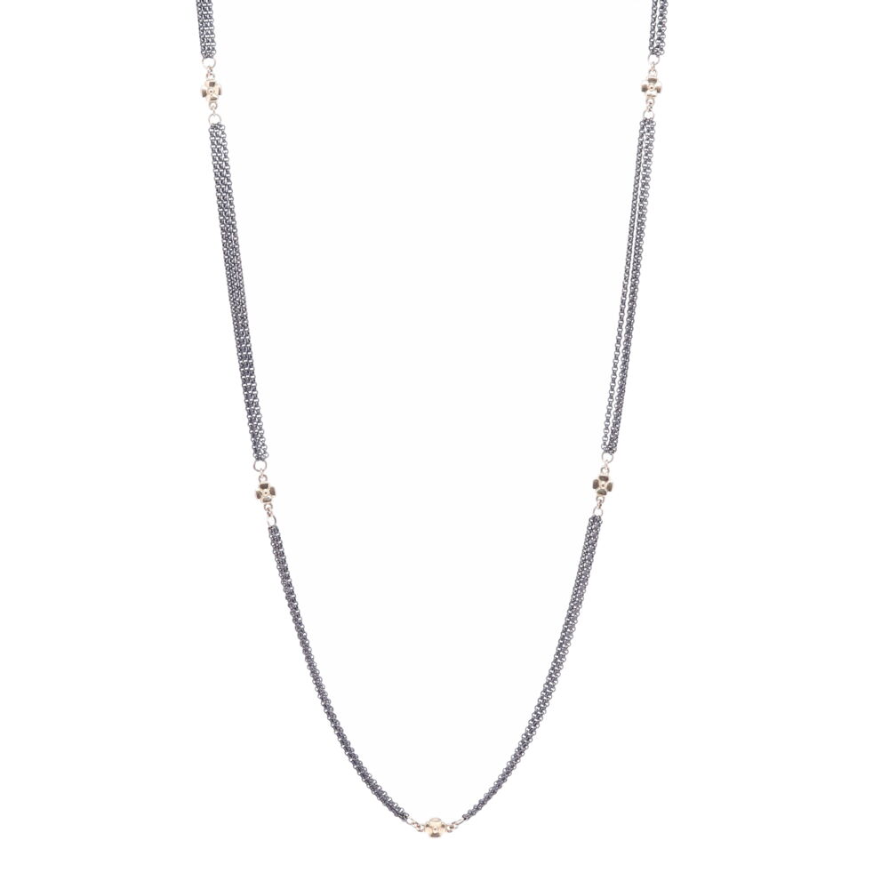 Handcrafted 14k gold cross stations are connected with three smaller rhodium sterling chains throughout the necklace. This chain consists of 4.91g 14k Gold and Rhodium Sterling. Cross Station Chain