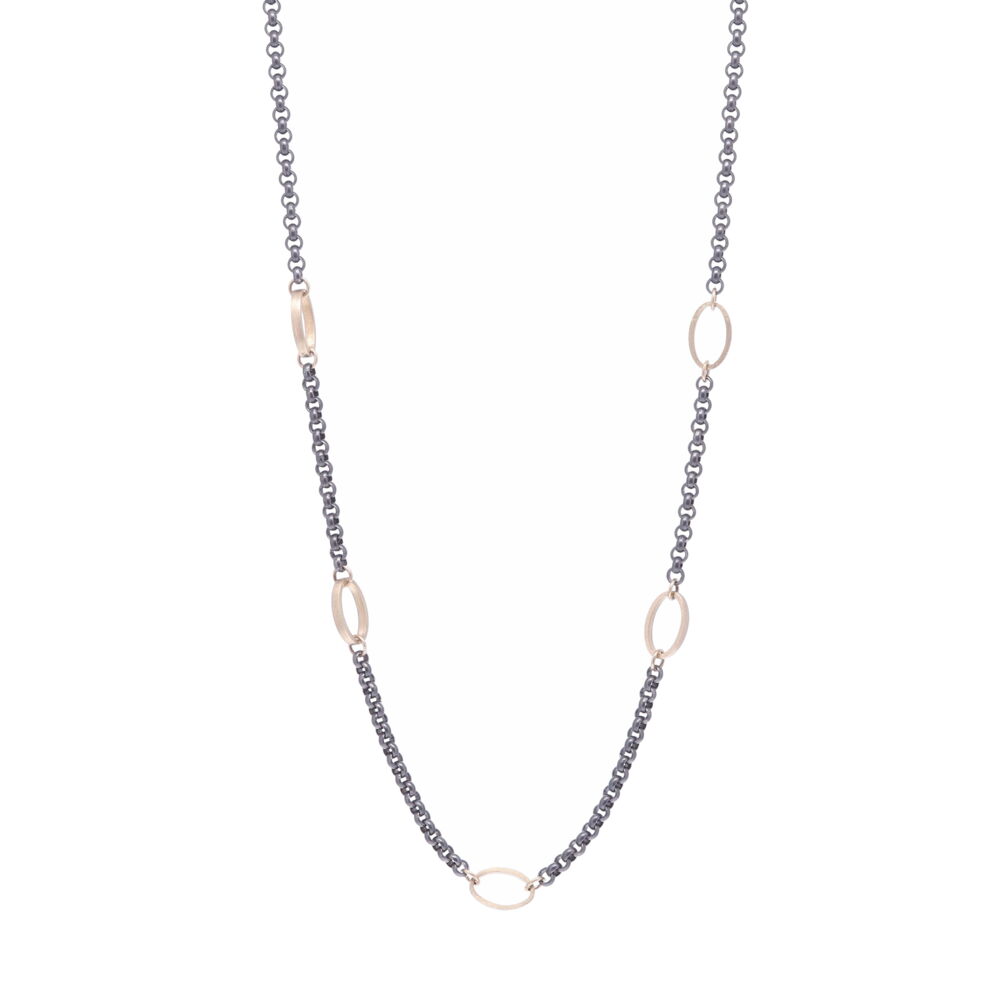 Handcrafted in rhodium sterling with five oval satin textured 14k Gold stations 6.23g. This multi use chain can can be worn as a long layer, a y-necklace, or doubled up. The clasp can be upgraded to a diamond clasp (contact for details). Oval Station Chain