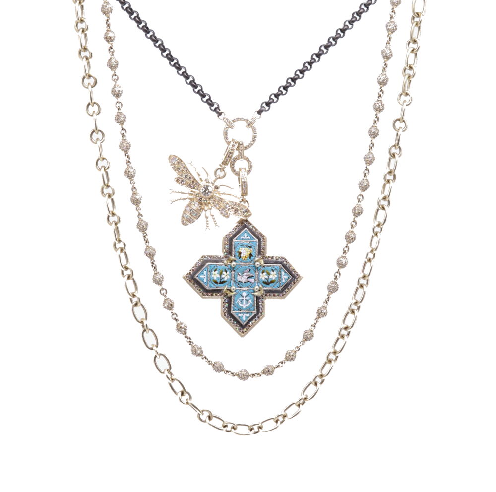 Handcrafted rhodium display chain that can hold 1-3 pendants comfortably. There are three options for chain style that can be at any length. The diamond weight is 0.32 tcw, with 3.10g of 14k gold. Classic Diamond Double Circle Display Necklace