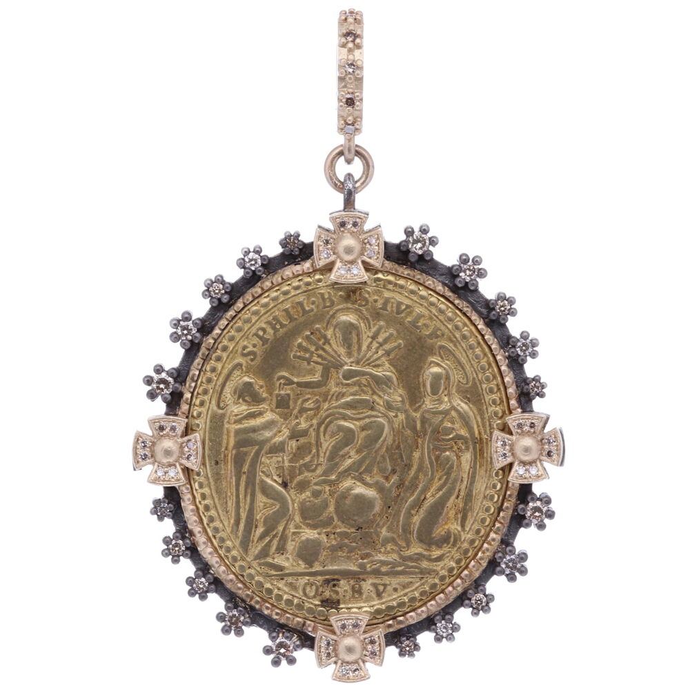 This medal depicts the Crucifixion of the Lady of Sorrows. The word compassion derives from the Latin roots cum and patior which means "to suffer with". The seven sorrows of the Blessed Mother are displayed in art history as seven daggers piercing her heart, often bleeding. This original Latin antiquity was handmade in bronze by a master craftsman. Cynthia Ann created a decorative bezel around to create this beautiful masterpiece. Latin Crucifixion of The Lady of Sorrows Pendant