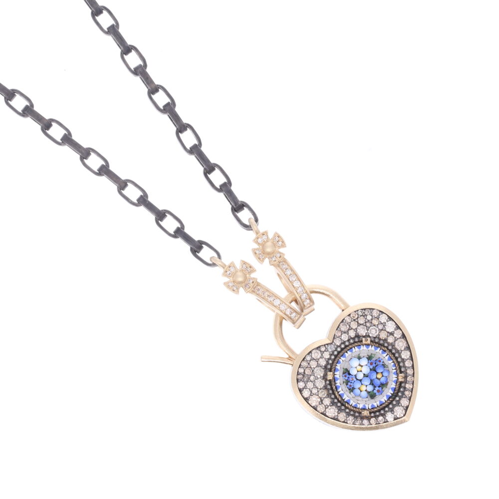 This chain has two bales that open so you can clip both ends on a pendant. The materials used are champagne diamonds 0.20 tcw, 14k yellow gold 3.81g, and rhodium silver. The length option provided is just calculating the chain. The yellow gold and diamond parts add 0.75" to the total length. Classic Cross Bale Display Necklace with Open-able Bales