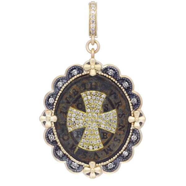 Closeup photo of Antique St Benedict Medal Pendant