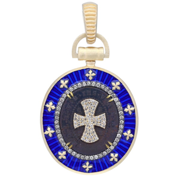 Closeup photo of Antique St Benedict Medal w/ Enamel Bezel