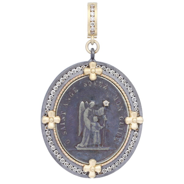 Closeup photo of Antique Guardian Angel Medal Pendant