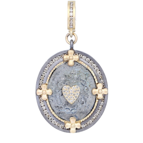 Closeup photo of Antique Sacred Heart Medal with Heart Overlay