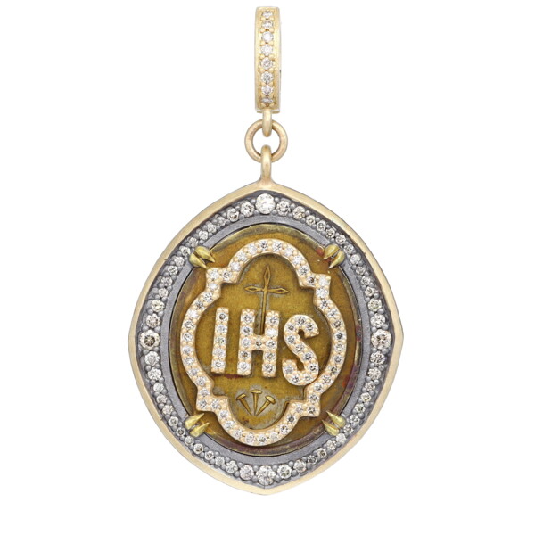 Closeup photo of Antique IHS Medal Pendant