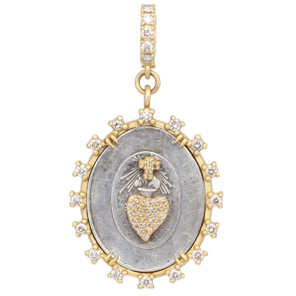 Closeup photo of Antique Sacred Heart Medal Pendant