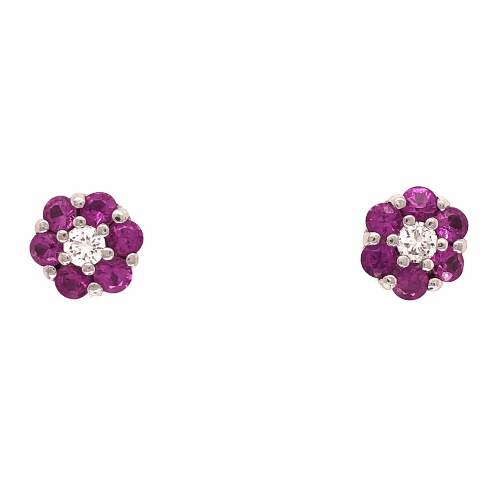 These earrings are very high quality, the back alone cost over $100 each if you need to replace them! They measure 9mm Diameter and have the High end 18K WG Friction Backs. 2 Diamonds are .28tcw & 12 Pink Sapphires are 1.45tcw 3.65g 18K White Gold Cluster Stud Earrings Diamonds Pink Sapphires