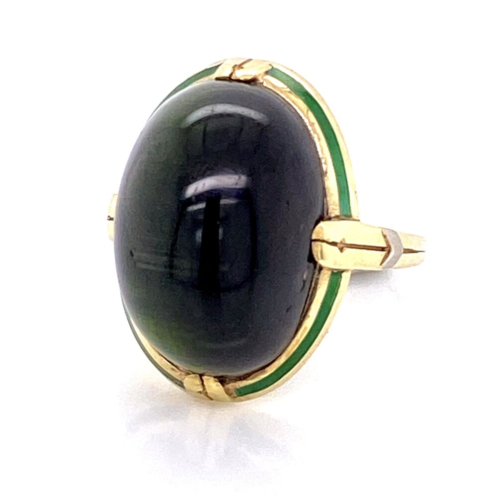 This amazing phenomenon rarely happens in tourmaline, so you have a rare stone in an even rarer Arts & Crafts Enamel Ring. Everything here is one of kind, you won't find another like it! 14K Yellow Gold Arts & Crafts Cat's Eye Tourmaline Ring with Engraving & Green Enamel