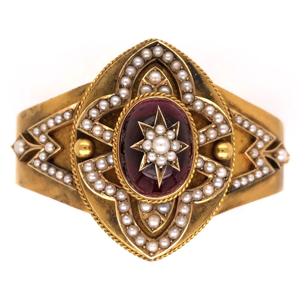 Victorian 14K yellow gold bangle bracelet with large cabochon Garnet, inlay of pearls.<div style="position: initial; margin: initial;"><span style="font-size: 16.8px; position: initial; margin: initial;"><a href="https://youtu.be/Df6pUQpA9g0" title="https://youtu.be/Df6pUQpA9g0" style="text-decoration: none;">https://youtu.be/Df6pUQpA9g0</a></span><br style="position: initial; margin: initial;"></div> 14K Yellow Gold Victorian Bangle Bracelet Large Cab Garnet inlayed with Pearls & Seed Pearls around 33.7g