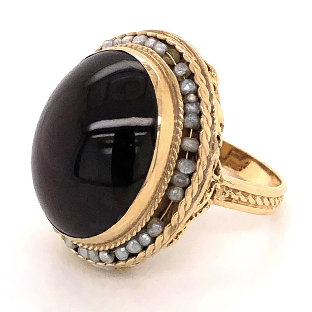 Size 7.25<div style="position: initial; margin: initial;"><span style="font-size: 16.8px; position: initial; margin: initial;"><a href="https://youtu.be/Zq8JhgTA3jc" title="https://youtu.be/Zq8JhgTA3jc" style="text-decoration: none;">https://youtu.be/Zq8JhgTA3jc</a></span><br style="position: initial; margin: initial;"></div> 14K Yellow Gold Victorian Revival 15ct Cabochon Garnet & Seed Pearl Ring 9.2g, s7.25