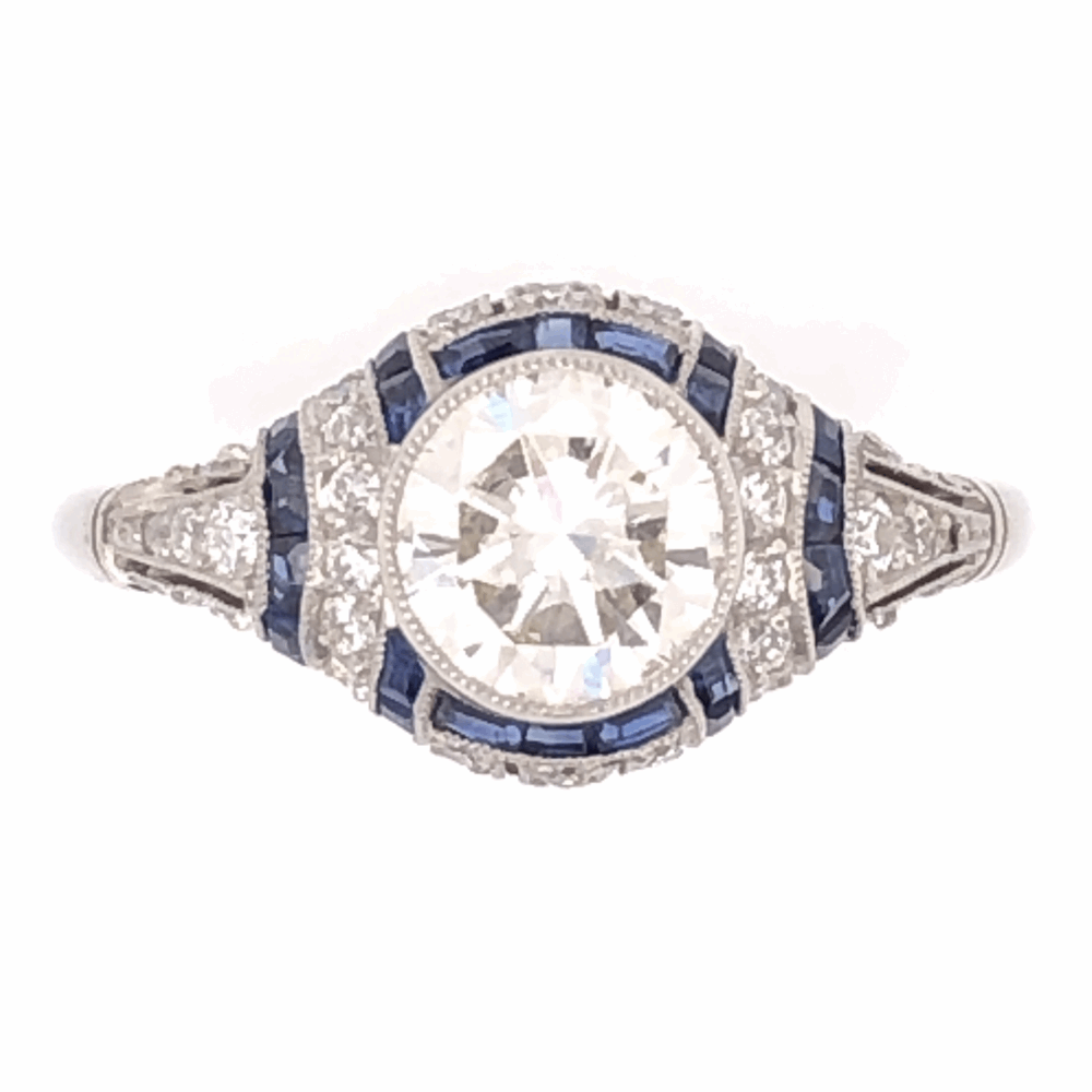 Art Deco Revival
.28tcw Side Diamonds Platinum Art Deco 1.04ct Round Brilliant & .48tcw Sapphire Filigree Ring, s6.5