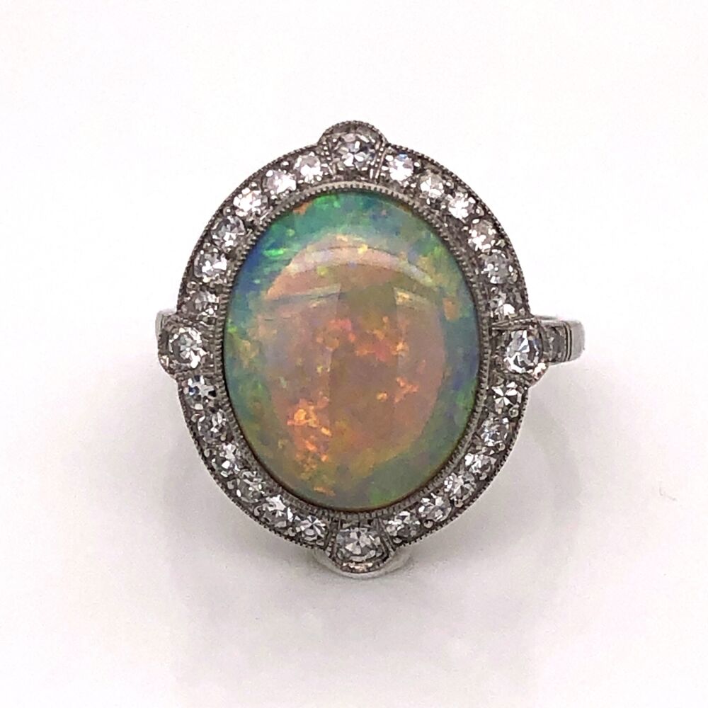 Size 6.75
19.20x16.70mm
Sits 7.90mm off the finger<div style="position: initial; margin: initial;"><span style="font-size: 16.8px; position: initial; margin: initial;"><a href="https://youtu.be/MEqm8wFEHlw" title="https://youtu.be/MEqm8wFEHlw" style="text-decoration: none;">https://youtu.be/MEqm8wFEHlw</a></span><br style="position: initial; margin: initial;"></div> Platinum Art Deco 3.20ct Oval White Opal & .54tcw Diamond Ring 6.15g, s6.75