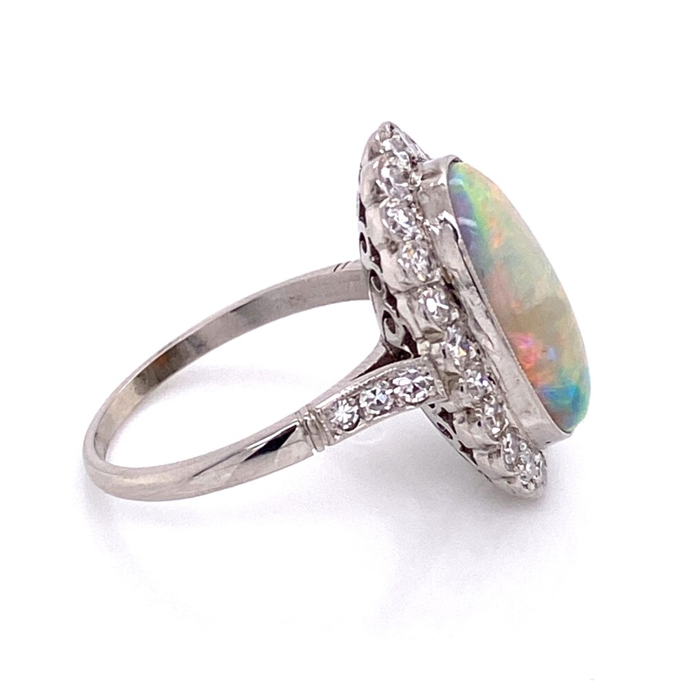 Size 6.75. 21x14mm, Sits 8.25mm off the finger.<div style="position: initial; margin: initial;"><span style="font-size: 16.8px; position: initial; margin: initial;"><a href="https://youtu.be/Mouw3sh80H0" title="https://youtu.be/Mouw3sh80H0" style="text-decoration: none;">https://youtu.be/Mouw3sh80H0</a></span><br style="position: initial; margin: initial;"></div> Platinum Art Deco 3.24ct Long White Opal & .69tcw Diamond Ring 6.1g, s6.75