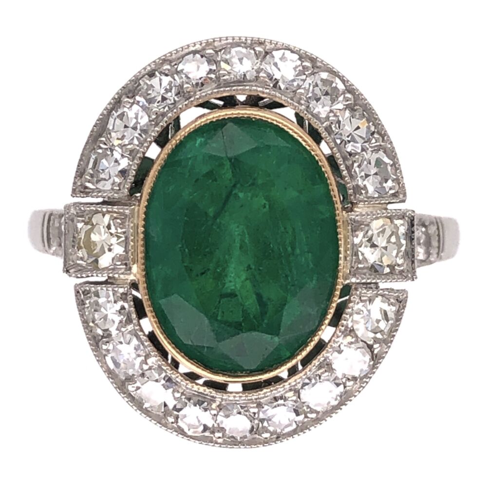 Platinum with 18K Yellow Gold Bezel around Emerald. The Green Color of the Emerald is some of the best you can get and is amazingly pleasing to the eye! The Art Deco Style handmade mounting is of the utmost quality, please do enjoy! Platinum Art Deco 2.72ct Oval Emerald & .72tcw Diamond Ring 4.6g, s6.75