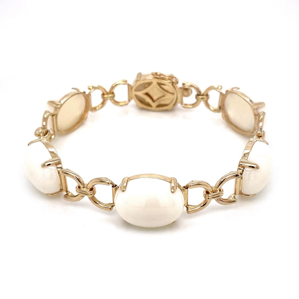6 Cabachon White Coral Ovals weigh approx 55tcw<div style="position: initial; margin: initial;"><span style="font-size: 16.8px; position: initial; margin: initial;"><a href="https://youtu.be/taj4J5EB4xE" title="https://youtu.be/taj4J5EB4xE" style="text-decoration: none;">https://youtu.be/taj4J5EB4xE</a></span><br style="position: initial; margin: initial;"></div> 14K Yellow Gold GUMPS White Coral Link Bracelet 23.4g, 7"