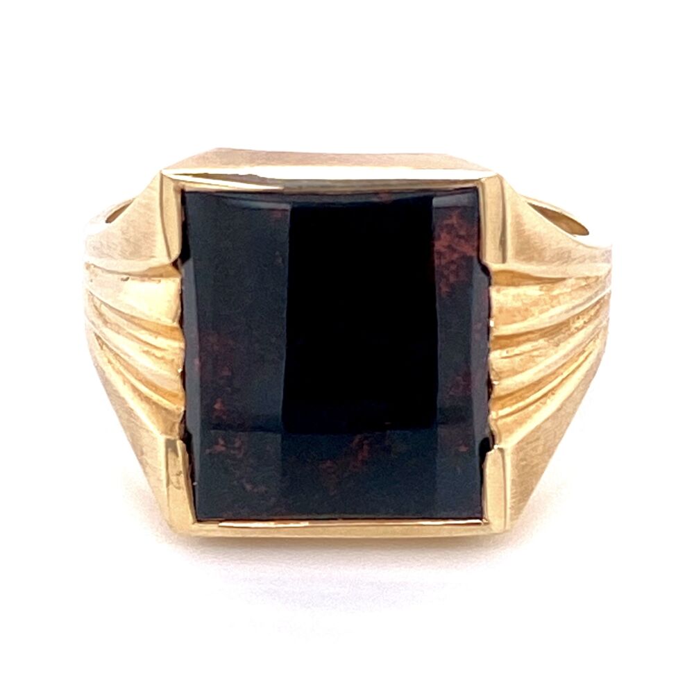 This Mens Victorian Revival Ring is a classic piece of history. The main gemstone is a square piece polished Bloodstone and has 3 fluted indentations on each side of the shank going up to the center stone. It is currently a finger size 10.5, but can be sized. It is 10K Yellow Gold and weighs a gross 5.5g 10K Yellow Gold Men's Square Bloodstone Victorian Revival Ring 5.5g