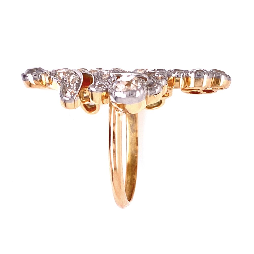 This ring looks like a marriage between a period correct brooch and a newer shank! Lots of old cut diamonds weighing approx. 2.30tcw Platinum & 18K YG Edwardian free form Diamond cluster ring 7.5g