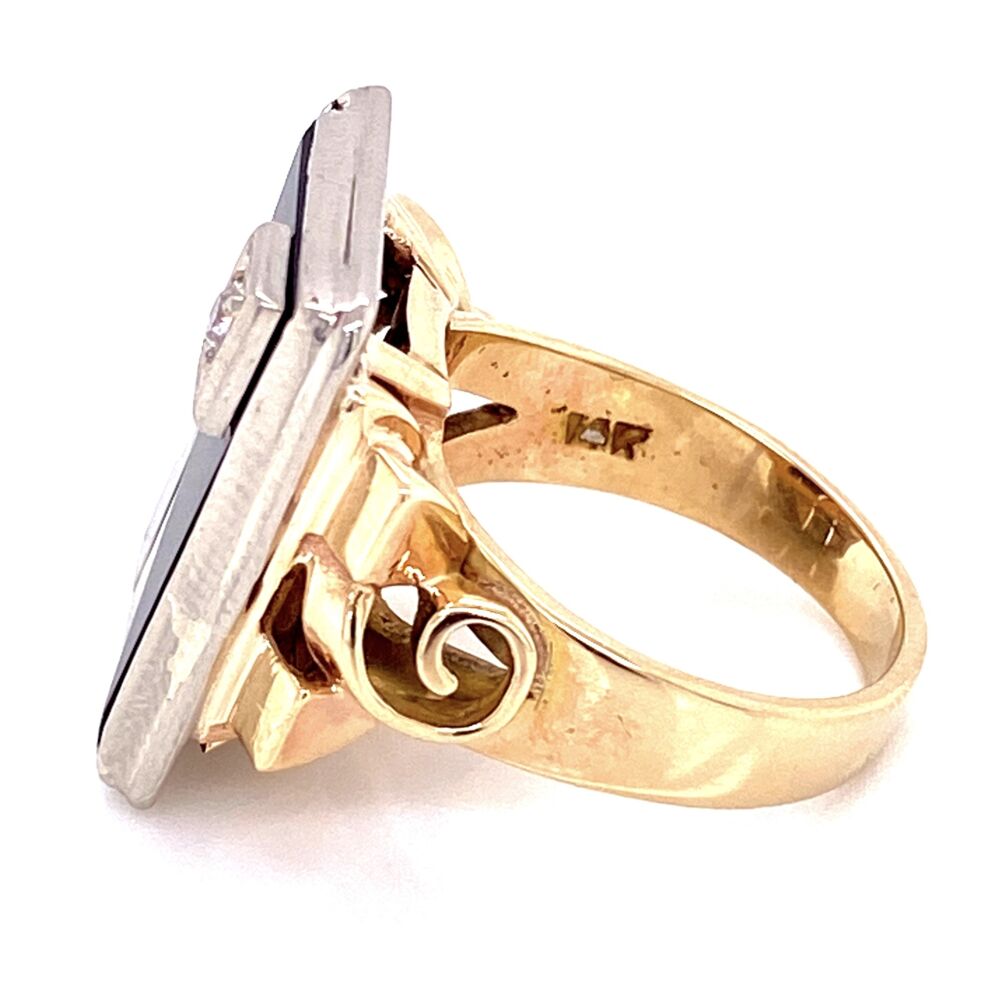 This Deco Ring has a Retro feel making this a late 1930's design. The deco onyx and .12ct Diamond on top sit like a table while the bottom and shank have retro scroll design. This ring is super cool and unusual! 14K 2tone Art Deco Onyx tablet & Diamond Ring 9.4g, s6.5