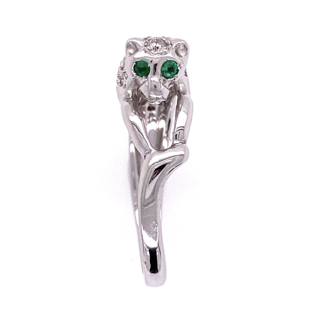Cartier, you better watch out! This ring has a great look with approx. .66tcw diamonds and emeralds for eyes!<div style="position: initial; margin: initial;"><span style="font-size: 16.8px; position: initial; margin: initial;"><a href="https://youtu.be/iZ-r1OPyOe4" title="https://youtu.be/iZ-r1OPyOe4" style="text-decoration: none;">https://youtu.be/iZ-r1OPyOe4</a></span><br style="position: initial; margin: initial;"></div> 18K White Gold Panther Diamond Ring, Emerald Eyes 6.2g