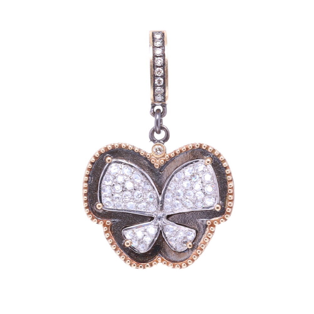 The butterfly is the symbol of resurrection and eternal life because they metamorphose from a caterpillar to a chrysalis and finally becomes a butterfly. Many believe that the soul left the body in the form of a butterfly. Aristotle named the butterfly 'psyche' which is the Greek word for Soul. This pendant has 3.6g 14k yellow gold, Diamonds 0.5 tcw, and rhodium sterling silver. The bale has a 4mm opening. Cynthia Ann Jewels Diamond Butterfly Pendant
