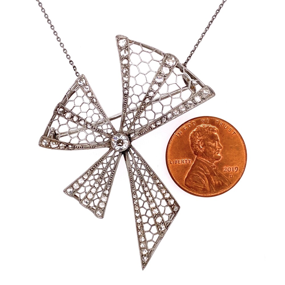 72 rose cut diamonds approx. .80tcw, line the the milgrain bow and the center is an old mine diamond approx .20ct<div style="position: initial; margin: initial;"><span style="font-size: 16.8px; position: initial; margin: initial;"><a href="https://youtu.be/_zfCwfwelMM" title="https://youtu.be/_zfCwfwelMM" style="text-decoration: none;">https://youtu.be/_zfCwfwelMM</a></span><br style="position: initial; margin: initial;"></div> Platinum Art Deco Bow Brooch Necklace 1.00tcw Diamonds 10.2g, 17"