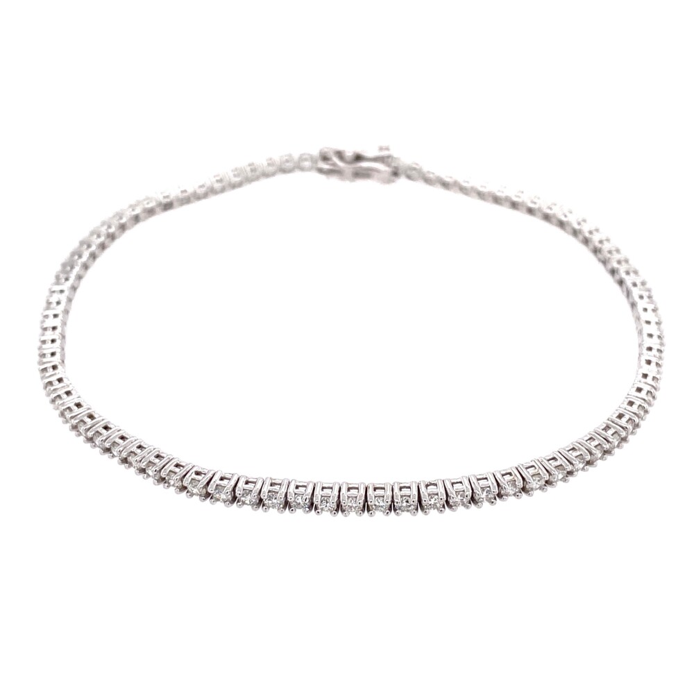 Beautiful & Classic, this straight line diamond tennis bracelet has 91 natural round brilliant diamonds weighing 1.91tcw, 6.3g gross weight and 7" long<div style="position: initial; margin: initial;"><span style="font-size: 16.8px; position: initial; margin: initial;"><a href="https://youtu.be/laqrgF7GasU" title="https://youtu.be/laqrgF7GasU" style="text-decoration: none;">https://youtu.be/laqrgF7GasU</a></span><br style="position: initial; margin: initial;"></div> 14K WG Straight Line Diamond Tennis Bracelet 1.91tcw, 7"