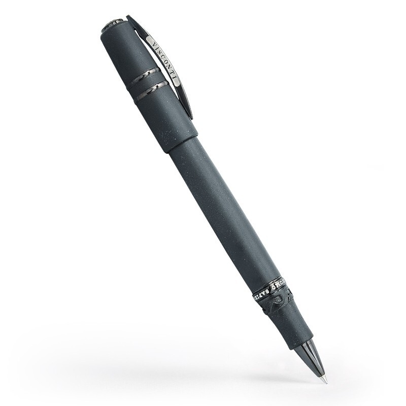 The material in this pen is as antique and natural as the world: lava from the Etna volcano. in south Italy. Nevertheless, it has several characteristics that render it unique in the manufacturing of writing instruments. Visconti has successfully produced a material containing pure basaltic lava, catalyzed together with resin in a formula patented thus obviously kept secret -whose extraordinary characteristics practically transforms it into a material perfectly fit to writing instruments. <div><br></div><div>Inspiration for all metallic trims was drawn from the Bronze Age, almost contemporary to the invention of writing. Visconti lava compound is virtually unbreakable, with a high degree of resilience. Flameproof, with a resistance to heat of over 100°C. Slightly hygroscopic, allowing to absorb hand sweat during use. Dense at touch, allowing the best finger-relaxing grip or touch. Unquestionably new, as materials employed in watch cases. The clip, the rings and the metal accessories are all in bronze: Natural bronze like the antique formula, that does not require plating or protection treatments. </div><div><br></div><div>Over the time, Natural bronze alters its original (almost pink) color. It can be easily polished with special cleaning pans The Lava material is a natural material; when daily used, the pen keeps its original dark grey color. If the pen is not used for a while or exposed to strong light it can become light grey. This is a certification of a real bio material. To regenerate the material, it is simple: just treat the pen with a common moisturizer.</div> Visconti Homo Sapiens Rollerball Pen in Dark Age