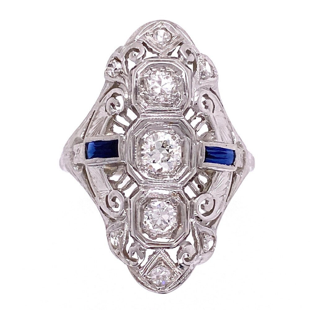 9 old cut round diamonds weigh approz .63tcw and there are lab grown blue sapphires approx. .10tcw<div style="position: initial; margin: initial;"><span style="font-size: 16.8px; position: initial; margin: initial;"><a href="https://youtu.be/q1jlL93RFLE" title="VIDEO" style="text-decoration: none;">https://youtu.be/q1jlL93RFLE</a></span><br style="position: initial; margin: initial;"></div> 18K WG Art Deco Navette Diamond & Sapphire Ring, s6.5
