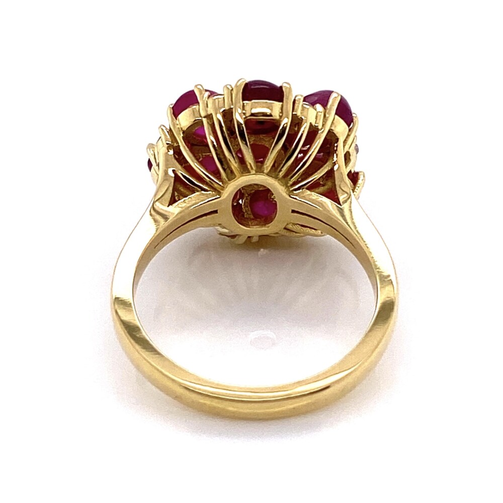 8 star rubies weigh approx. 7.50tcw. The Rubies are no heat and likely from Burma origin!<div style="position: initial; margin: initial;"><span style="font-size: 16.8px; position: initial; margin: initial;"><a href="https://youtu.be/5os2R1HqIzg" title="https://youtu.be/5os2R1HqIzg" style="text-decoration: none;">https://youtu.be/5os2R1HqIzg</a></span><br style="position: initial; margin: initial;"></div> 18K YG 1960's 7.5tcw Burma Star Ruby Cluster Ring with .27tcw Diamonds, s7