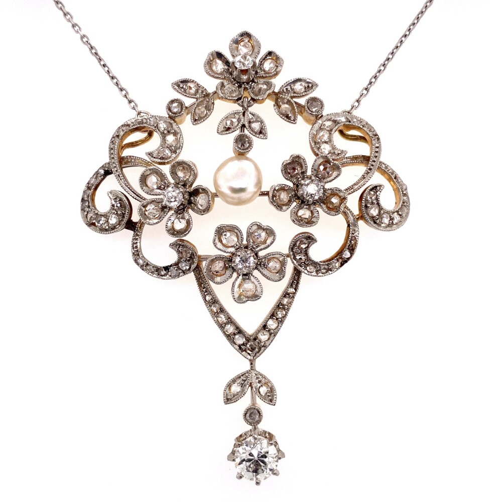 Platinum on 18K Yellow Gold is super cool, the bottom drop diamond is an old european cut weighing approx. .55ct, the side diamonds are old european cut and rose cut diamonds weighing approx. 2.25tcw and the center natural pearl has beautiful nacre luster. The chain is 17" and fabricated in 14K White Gold.<div style="position: initial; margin: initial;"><span style="font-size: 16.8px; position: initial; margin: initial;"><a href="https://youtu.be/s8-uzgSdIvI" title="https://youtu.be/s8-uzgSdIvI" style="text-decoration: none;">https://youtu.be/s8-uzgSdIvI</a></span><br style="position: initial; margin: initial;"></div> Platinum on 18K Edwardian 2.80tcw Diamond & Natural Pearl Necklace, 14K Chain 17"