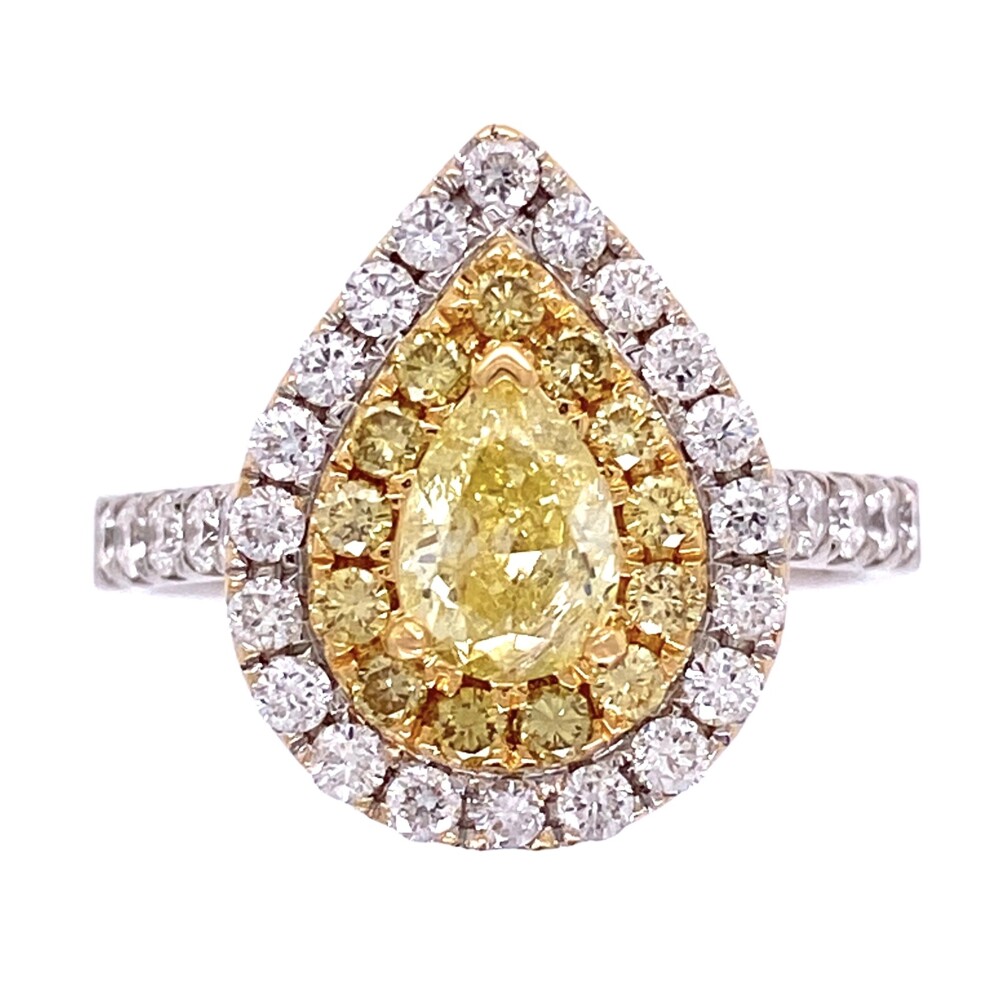 The center pear shape natural yellow diamond weighs approx. .60ct, the first halo consists of 13 natural round brilliant yellow diamonds weighing approx. .26tcw, the second halo and shank contain 20 round brilliant white diamonds weighing approx. .40tcw & the shanks have 5 diamonds each side(10 total) round brilliant white diamonds weighing approx. .30tcw making this a very well made ring with beautiful diamonds. The center diamond looks to an I1 clarity under 10x magnification, but all the other are VS and bright!<div style="position: initial; margin: initial;"><span style="font-size: 16.8px; position: initial; margin: initial;"><a href="https://youtu.be/XFkY8DyNkY0" title="https://youtu.be/XFkY8DyNkY0" style="text-decoration: none;">https://youtu.be/XFkY8DyNkY0</a></span><br style="position: initial; margin: initial;"></div> 18K WG .1.56tcw Pear Shape Yellow Diamond with Double Halo Diamond Ring 6.6g, s8
