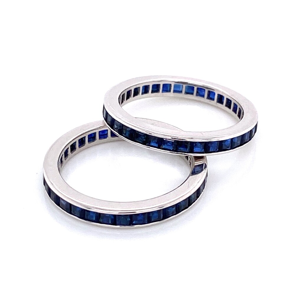 This pair of bands are very well made, but with lab created sapphires and fit as a big size 6. Get these at well below market value!<div style="position: initial; margin: initial;"><span style="font-size: 16.8px; position: initial; margin: initial;"><a href="https://youtu.be/bZ_PiOtrmYI" title="https://youtu.be/bZ_PiOtrmYI" style="text-decoration: none;">https://youtu.be/bZ_PiOtrmYI</a></span><br style="position: initial; margin: initial;"></div> Pair of 14K WG Syn. Blue Sapphire Eternity Bands 4.2g, s6+