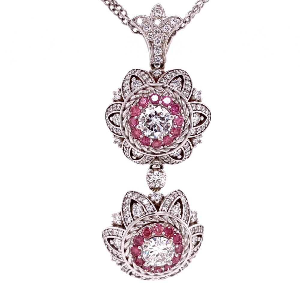 This is a finely made custom piece made and stamped by Mayor's 750 (18k), out of South Florida. There are two drops with large center round brilliant diamonds approx. .65ct & .60ct, a halo of pink diamonds, approx. .48tcw, and then flower detailing set with diamonds approx. 1.54tcw. The chain is soldered in place and is stamped "Gabriel & Co" & "14K" so appears to be added as an afterthought, but it really ties this piece together with it's 4 diamond set barrels and double chain design, .10tcw.<div style="position: initial; margin: initial;"><span style="font-size: 16.8px; position: initial; margin: initial;"><a href="https://youtu.be/iwF4675yBdo" title="https://youtu.be/iwF4675yBdo" style="text-decoration: none; position: initial; margin: initial;">https://youtu.be/iwF4675yBdo</a></span><br style="position: initial; margin: initial;"></div><div style="position: initial; margin: initial;"><span style="font-size: 16.8px; position: initial; margin: initial;"><a href="https://youtu.be/a784oLpSaOM" title="https://youtu.be/a784oLpSaOM" style="text-decoration: none;">https://youtu.be/a784oLpSaOM</a></span><br style="position: initial; margin: initial;"></div> 18K WG MAYOR'S Custom Double Drop Pendant White & Pink Diamonds 19.4g