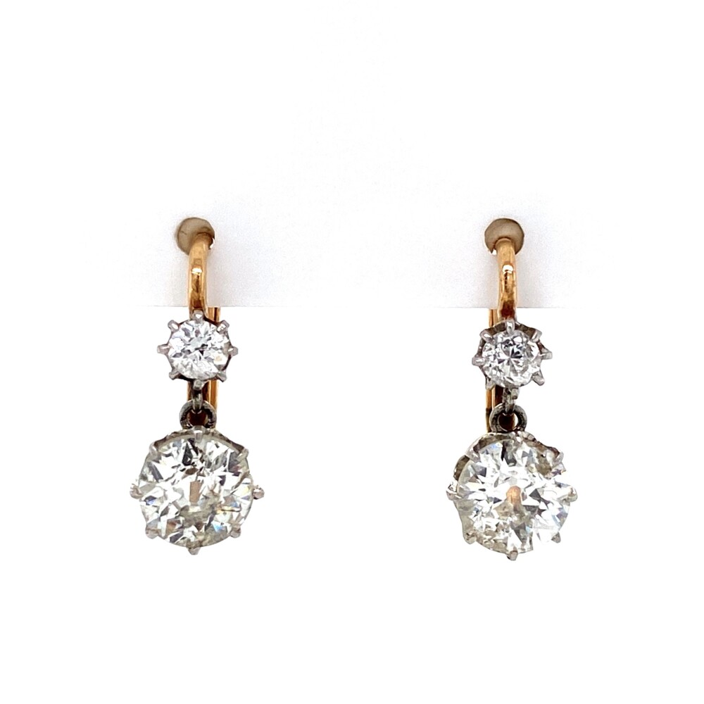 Bottom diamonds measure 6.28mm and weigh approx. 1ct each<div style="position: initial; margin: initial;"><span style="font-size: 16.8px; position: initial; margin: initial;"><a href="https://youtu.be/GqYUsA9x9Uo" title="https://youtu.be/GqYUsA9x9Uo" style="text-decoration: none;">https://youtu.be/GqYUsA9x9Uo</a></span><br style="position: initial; margin: initial;"></div> Platinum on Gold Victorian 2.20tcw Diamond Drop Earrings 3.2g, .6"