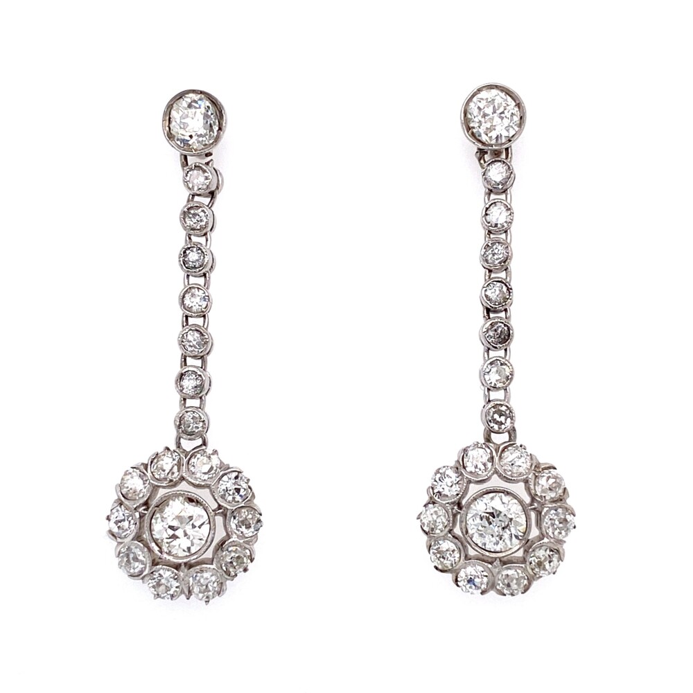 Each earring has a top old european diamond about .33ct with 7 bezel set diamonds hanging to connect a diamond halo bottom with 1.50tcw each.<div style="position: initial; margin: initial;"><br style="position: initial; margin: initial;"></div><div style="position: initial; margin: initial;"><span style="font-size: 16.8px; position: initial; margin: initial;"></span><a href="https://youtu.be/qhfib2JvBTc" title="https://youtu.be/qhfib2JvBTc" style="text-decoration: none;">https://youtu.be/qhfib2JvBTc<span style="font-size: 16.8px; position: initial; margin: initial;">https://youtu.be/qhfib2JvBTc</span><br style="position: initial; margin: initial;"><div style="position: initial; margin: initial;"></div></a><div style="position: initial; margin: initial;"><br style="position: initial; margin: initial;"></div><div style="position: initial; margin: initial;"><br style="position: initial; margin: initial;"></div></div> Platinum Art Deco 4.04tcw Diamond Drop Earrings 6.9g, 1.5"