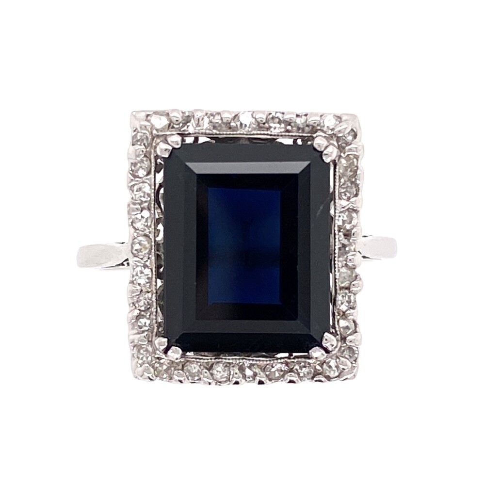 32 diamonds are approx .20tcw<div style="position: initial; margin: initial;"><span style="font-size: 16.8px; position: initial; margin: initial;"><a href="https://youtu.be/ItGQf6zJQeM" title="https://youtu.be/ItGQf6zJQeM" style="text-decoration: none;">https://youtu.be/ItGQf6zJQeM</a></span><br style="position: initial; margin: initial;"></div> Platinum 6ct Dark Blue Sapphire & .20tcw Diamond Ring 4.8g, s6.5