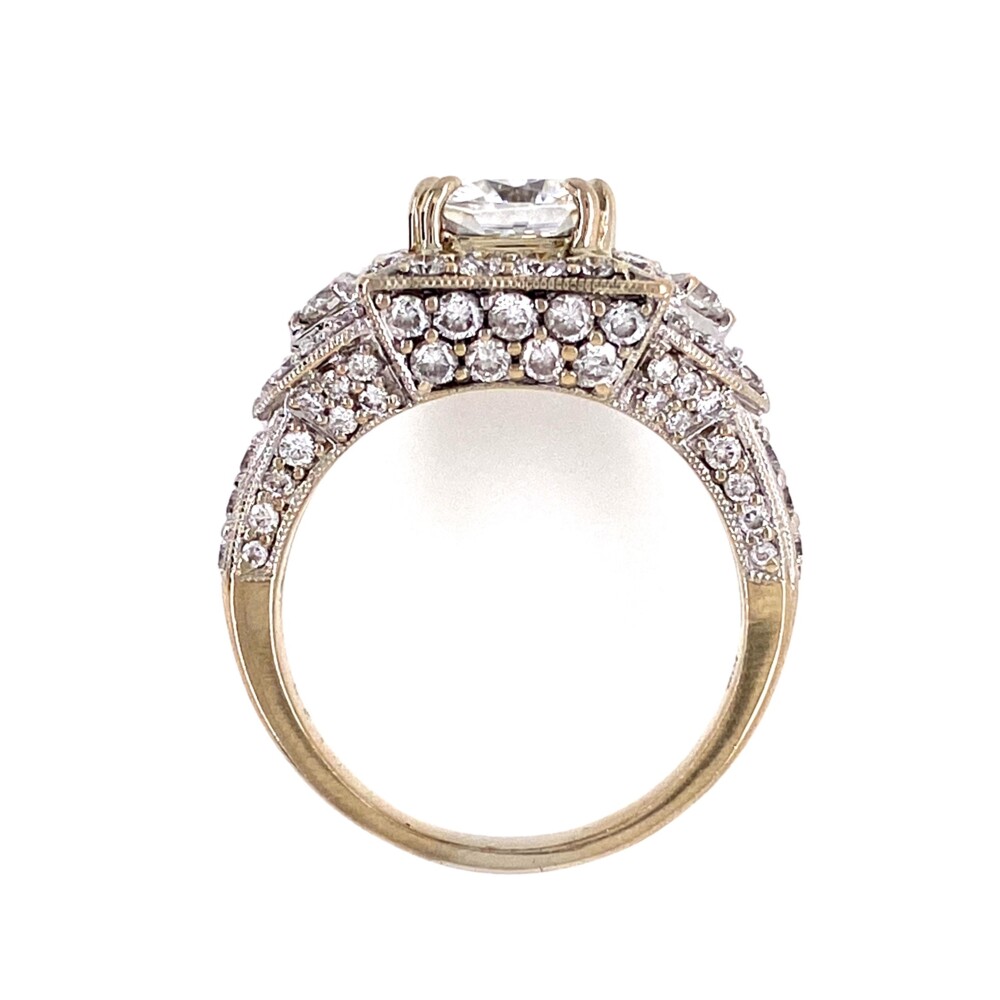 The center is a beautiful approx. 2.00ct fancy cushion cut Moissanite gemstone and the ring has 91 round brilliant diamonds weighing 1.35tcw and is cast constructed very fine. The diamonds are judged F/G color, VS clarity and Moissanite H color, VVS clarity.<div style="position: initial; margin: initial;"><span style="font-size: 16.8px; position: initial; margin: initial;"><a href="https://youtu.be/VPRc6C9vOJE" title="https://youtu.be/VPRc6C9vOJE" style="text-decoration: none;">https://youtu.be/VPRc6C9vOJE</a></span><br style="position: initial; margin: initial;"></div> 18K WG 2ct Cushion Moissanite & 1.35tcw Diamond Ring 6.8g, s6.5