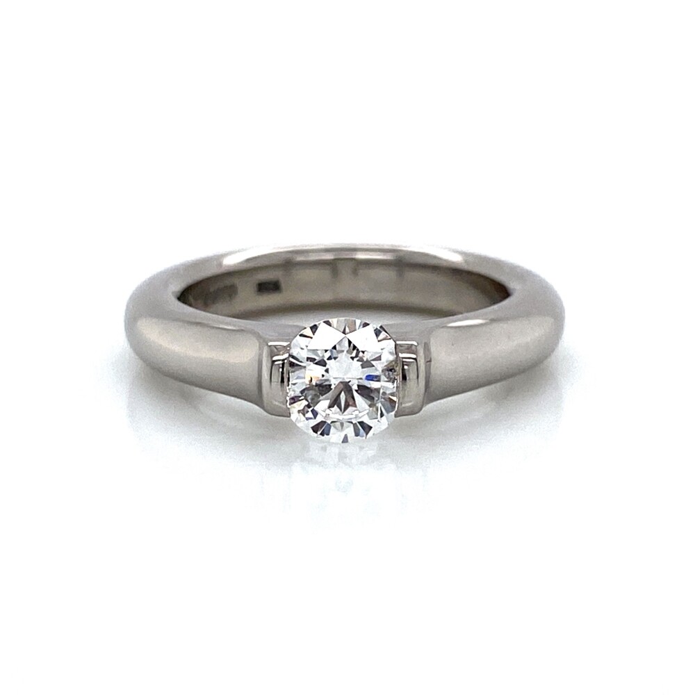 This is the classic Steven Kretchmer Omega tension set ring with a natural round brilliant diamond .70ct, F-SI1, GIA report #10333451. This shank is stamped, "PT950, Logo, 1990, USA, 8686". Gross weight is 10.6g<div style="position: initial; margin: initial;"><span style="font-size: 16.8px; position: initial; margin: initial;"><a href="https://youtu.be/vExOAhXpZHQ" title="https://youtu.be/vExOAhXpZHQ" style="text-decoration: none;">https://youtu.be/vExOAhXpZHQ</a></span><br style="position: initial; margin: initial;"></div> Platinum Tension Set Omega Ring .70ct Diamond F-SI1 GIA, s5.5+