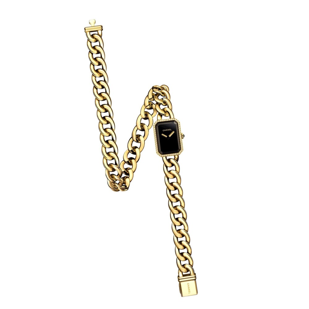 Like New, Never Worn, receipt showing $36K paid($34,000 before sales tax), 18kt yellow gold octagonal-shaped case, bezel set with 56 diamonds (0.19 carats), polished 18kt yellow gold double row bracelet with black lacquered dial with gold hands and the crown is set with onyx cabochon.
Case Dimensions 16mm X 22mm
Case Thickness 6.2mm
Case Material 18kt Yellow Gold
Dial Color Black
Crystal Scratch Resistant Sapphire
Bezel Fixed
Screw-in Crown No
Water Resistance 30m/100ft
Case Back Solid
Band Material 18kt Yellow Gold
Color/Finish Polished
Clasp Jewellery Clasp
Movement Quartz 18K YG Chanel H3750 Diamond Watch Double Wrap Curb Link Bracelet